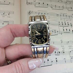Silvertonw and Goldtone Bangle Watch